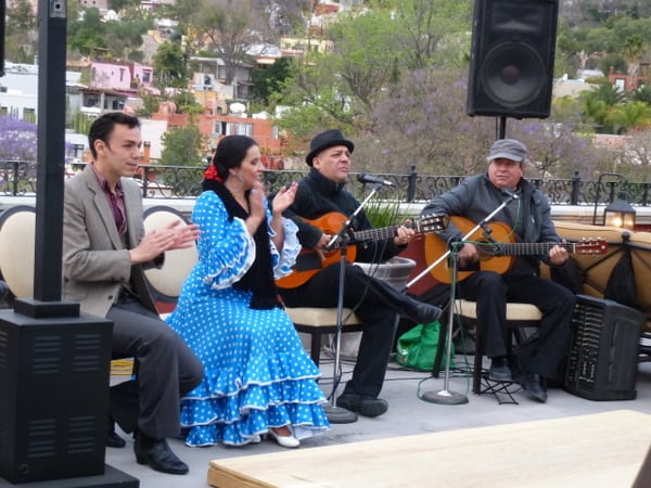 Musicians and flamenco dancers entertain at the Luna bar