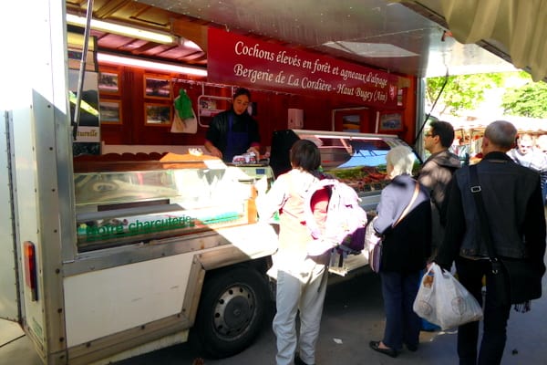 Commuters queue for their dinner ingredients