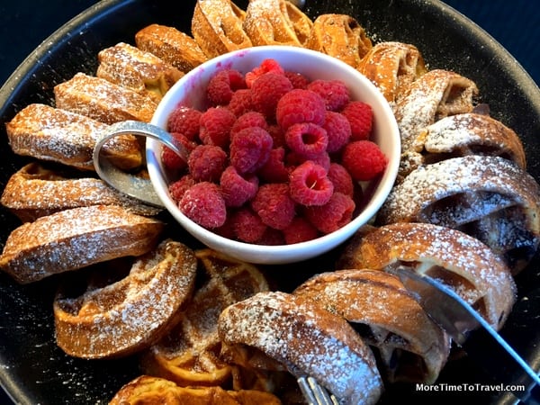 Chocolate chip waffles with raspberries at the Centurion Lounge at LGA