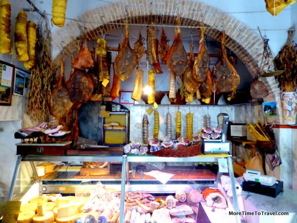 Salumi (cured meats) on display at the butcher shop in Bevagna