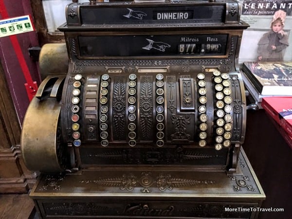 Old cash register at the rear of the shop
