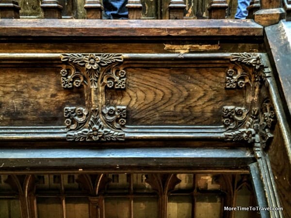 Detail showing the painted plaster almost indistinguishable from wood