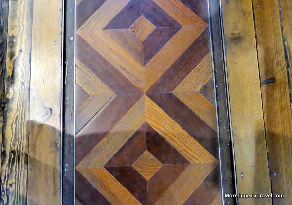 Parquet floors with tracks for a bookcart