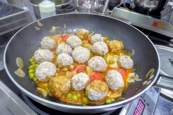 Polpette (meatballs) sizzling in the pan (Credit: Jerome Levine)