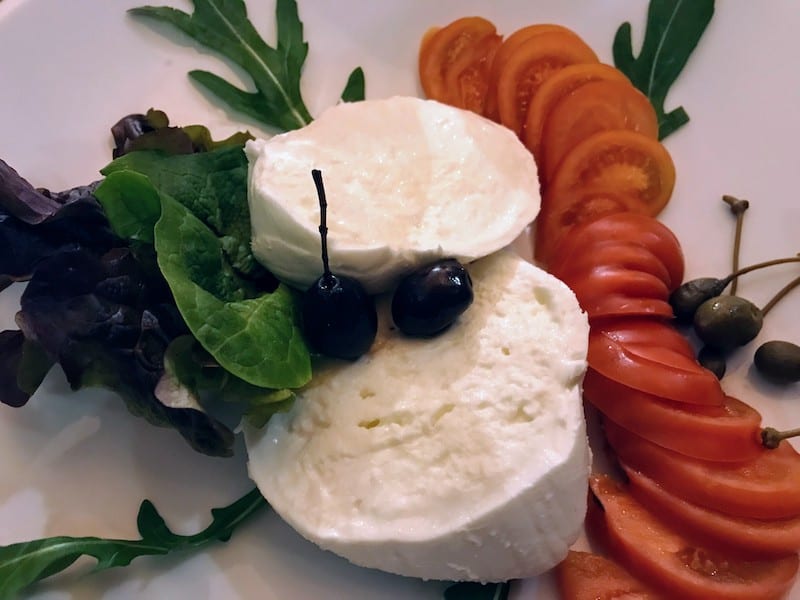 Salad plate with burrata and tomatoes