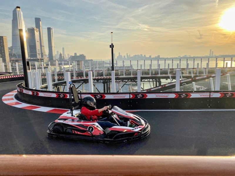Suspended 13 feet over the ship's side, the Speedway is the longest go-kart racing track at sea.