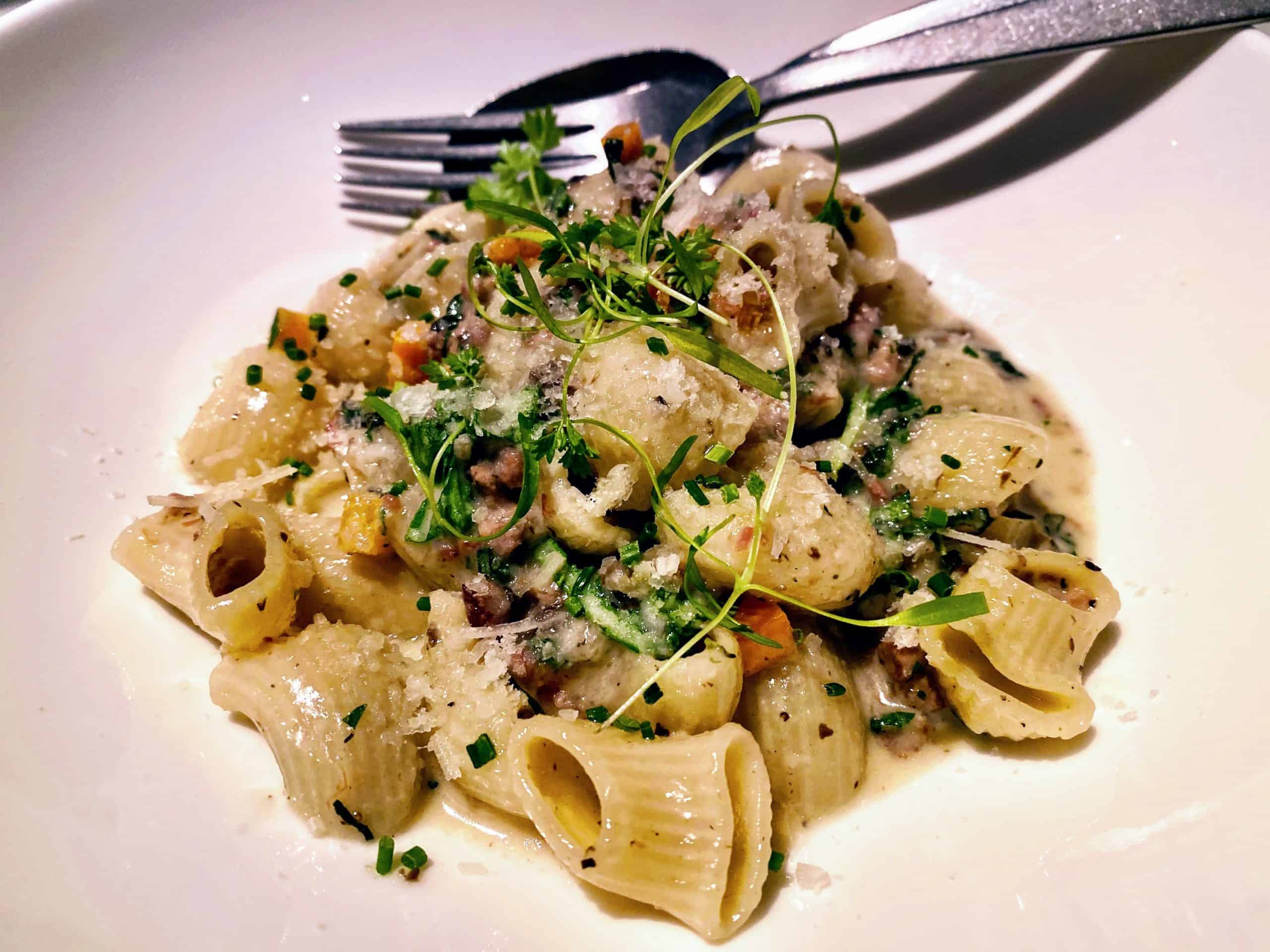Best Meals: One of the Chef Portale's signature dishes, lumache pasta with short rib, Bolognese bianco, black truffle, and parmigiano cheese