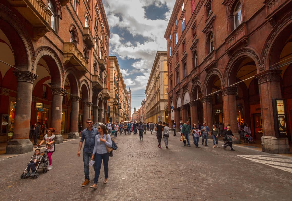 Porticoes on the busy shopping street, Via Indipendenza