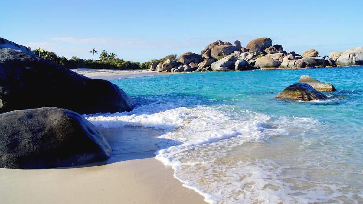 charter a yacht in the British Virgin Islands and Visit Devil's Bay in TortolaZr