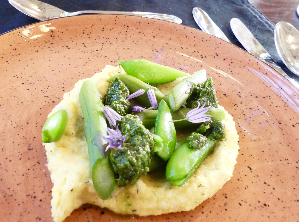Popcorn polenta with spring vegetables and herbs