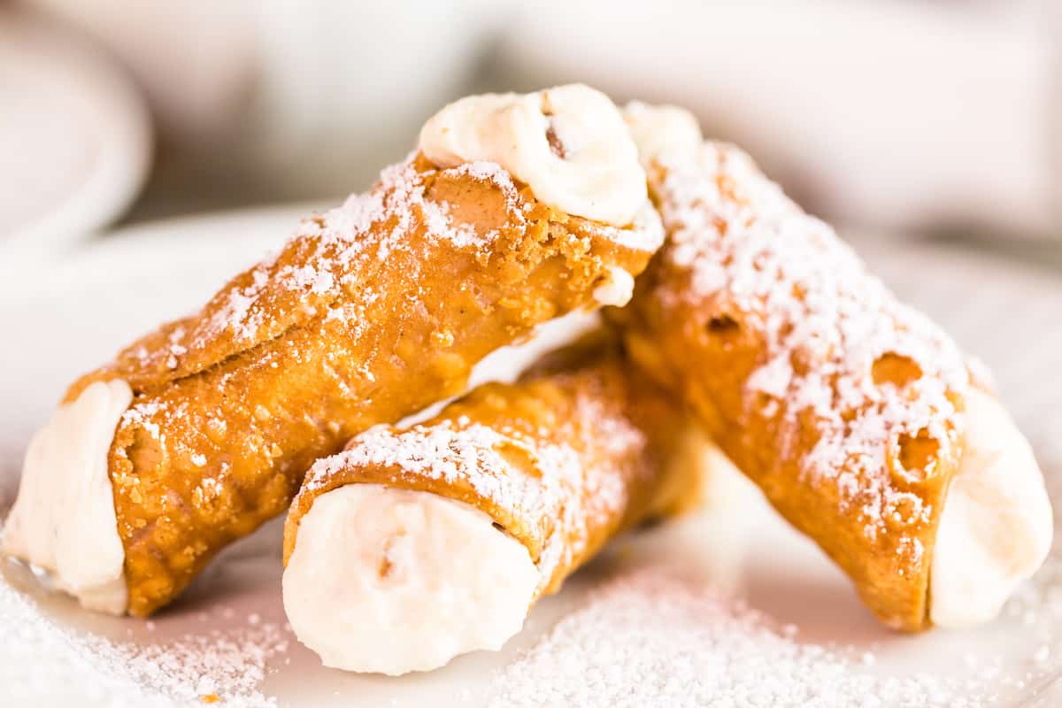 try authentic cannolis, one of the most iconic desserts of the region. 