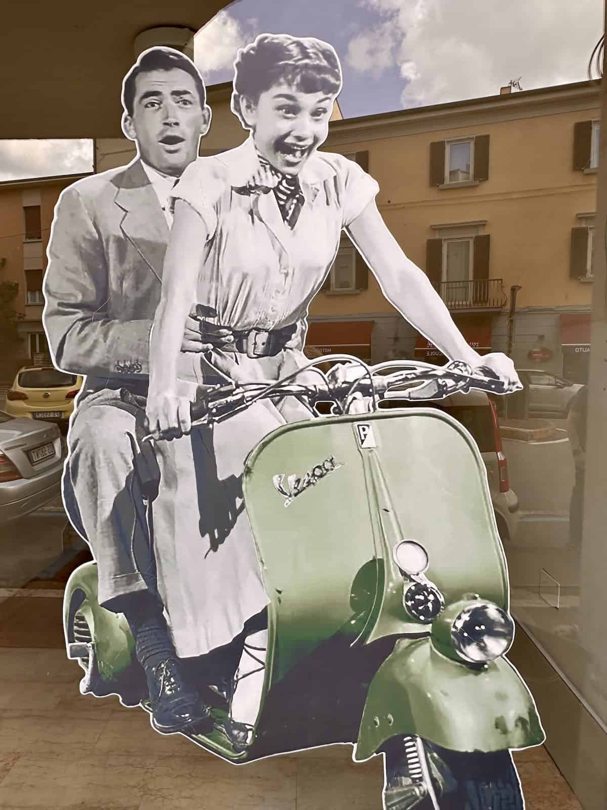 Shop window in Pontedera, the Vespa was popularized in the movie, Roman Holiday