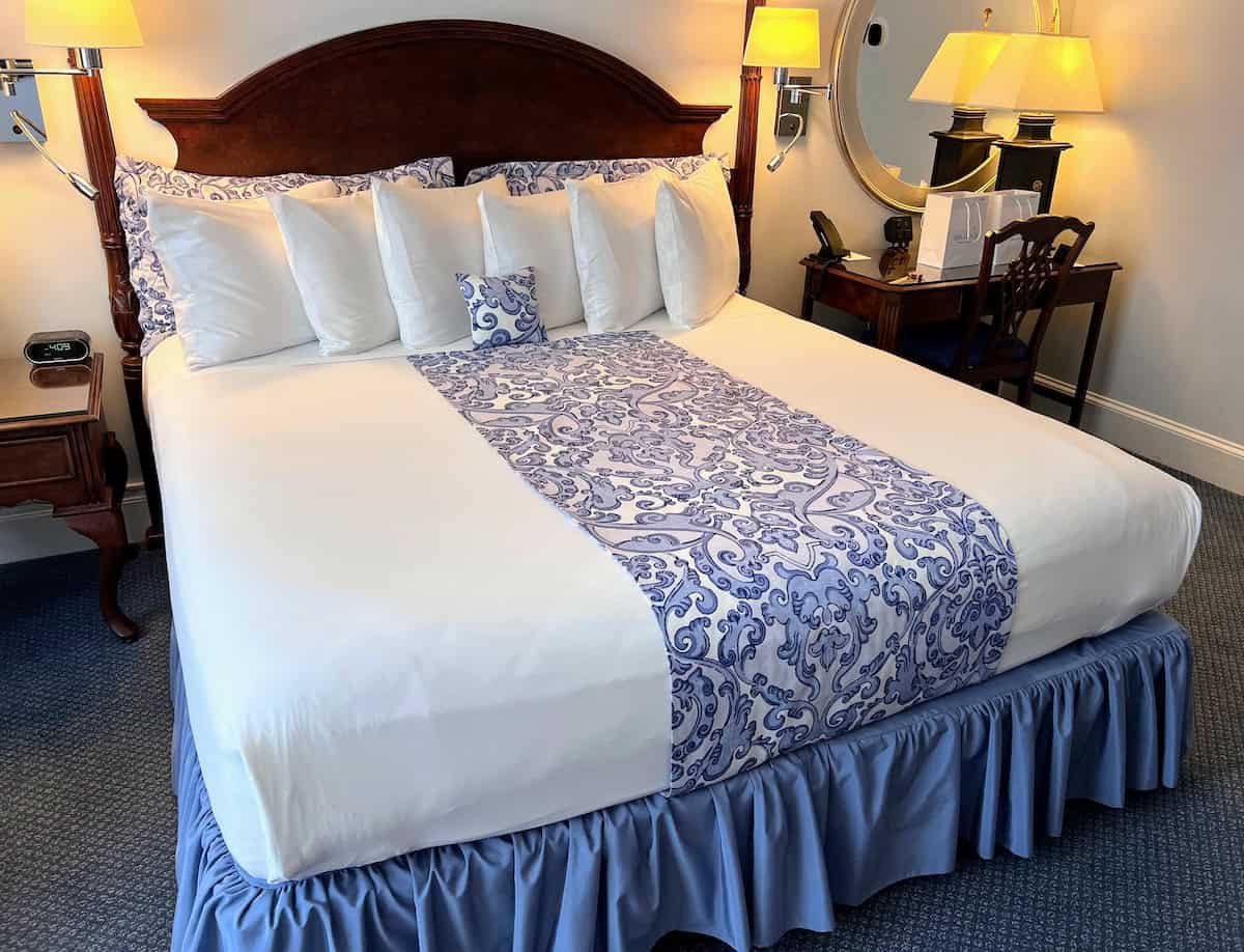 Our inviting King Bed with reading lights at the Saratoga Arms