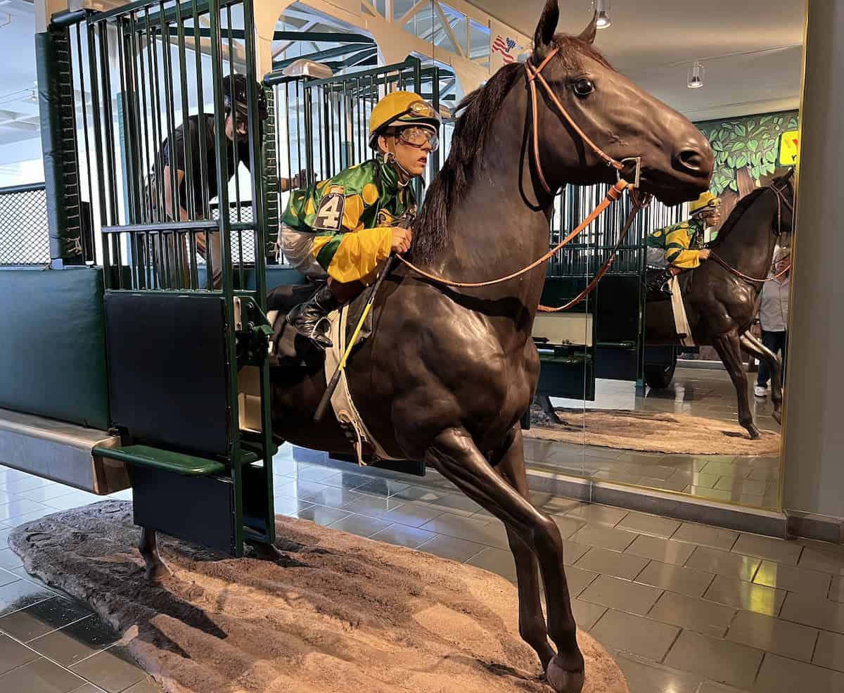 Life-sized replica of Jockey on horse at museum; notice the diminuitive size of the jockey