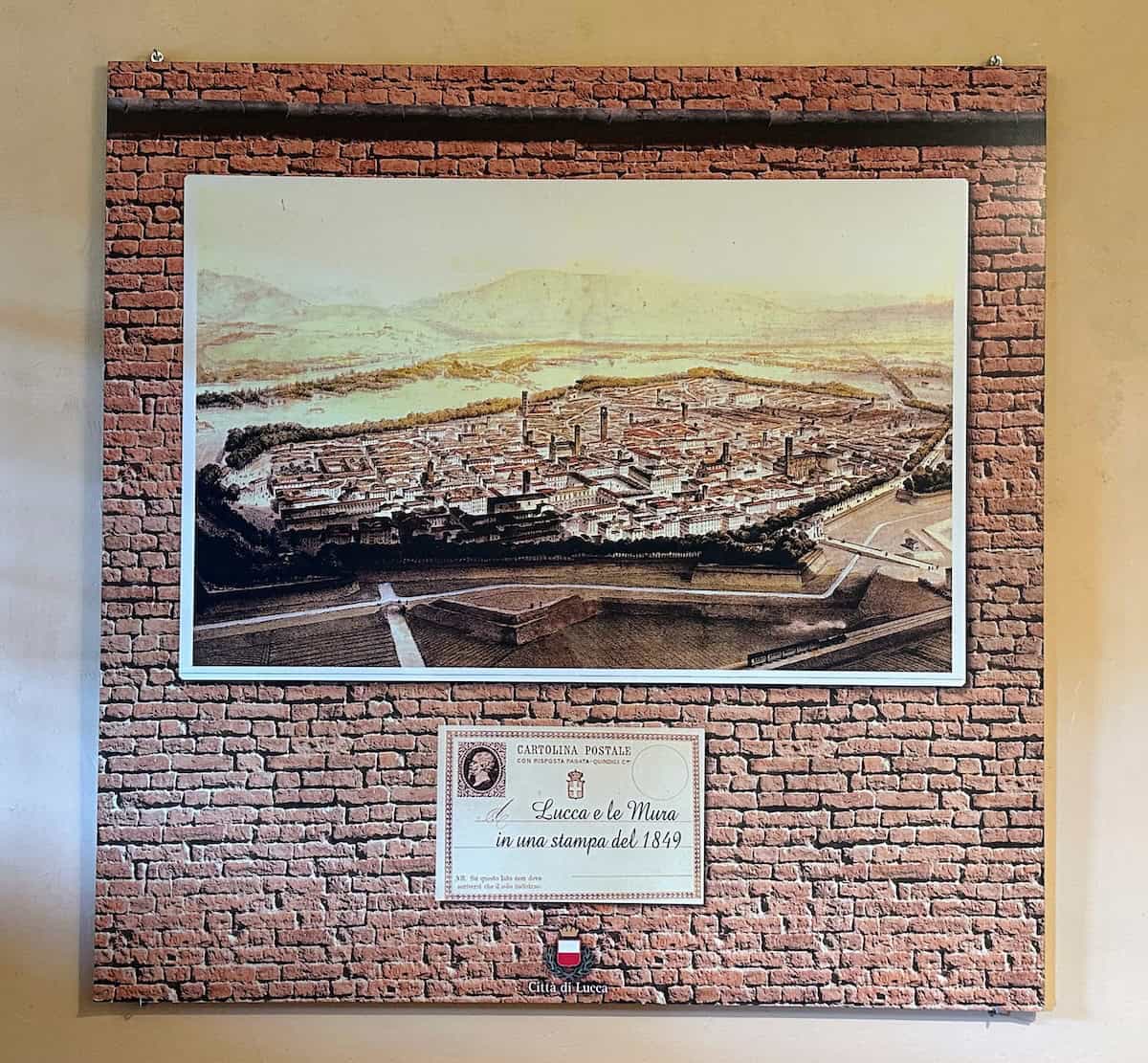 Postal stamp from 1849 showing the walls of Lucca (in display at the InfoPoint)