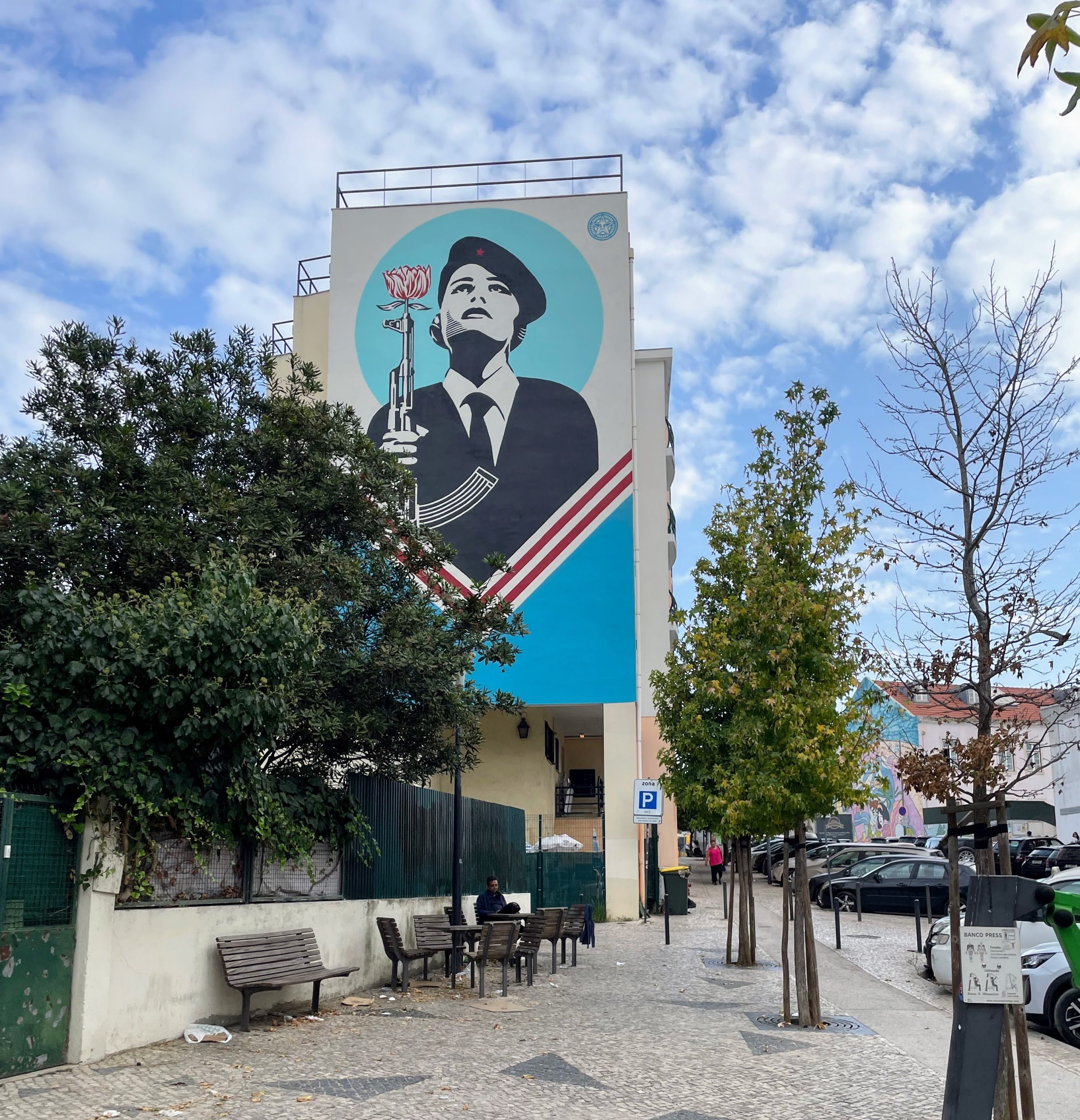 Peace Guard artwork by American artist Shepard Fairey in Graça neighborhood depicts woman in a revolutionary beret (credit: Ali Webb and Keith Kehlbeck)