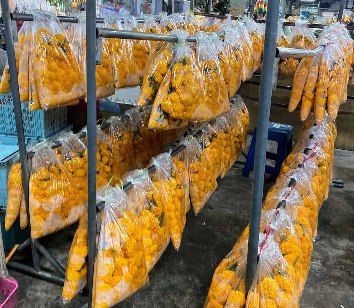 Bags of marigolds at the Bangkok flower market (credit: Ali Webb & Keith Kehlbeck)