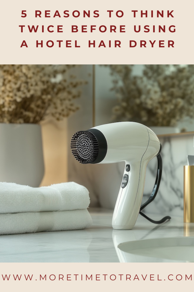 Hair Dryer in hotel pin (credit: Adobe Stock)