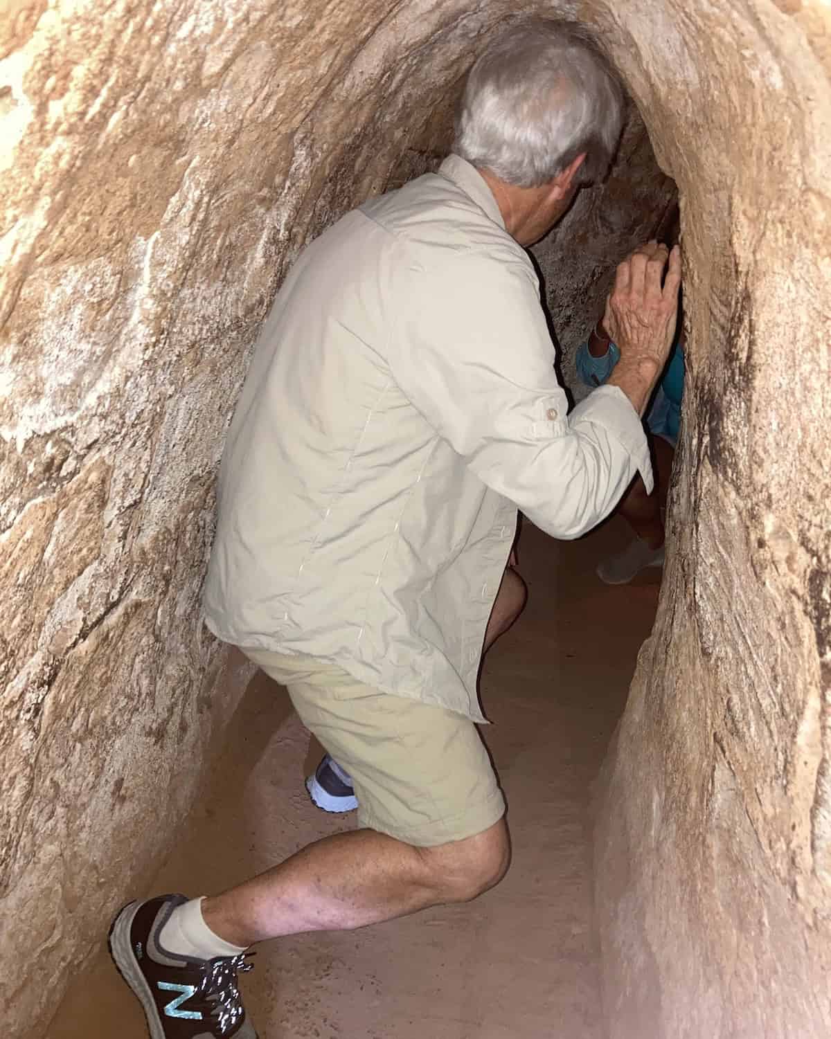 Navigating a narrow passageway in the Cu Chi Tunnels (credit: Keith Kehlbeck)
