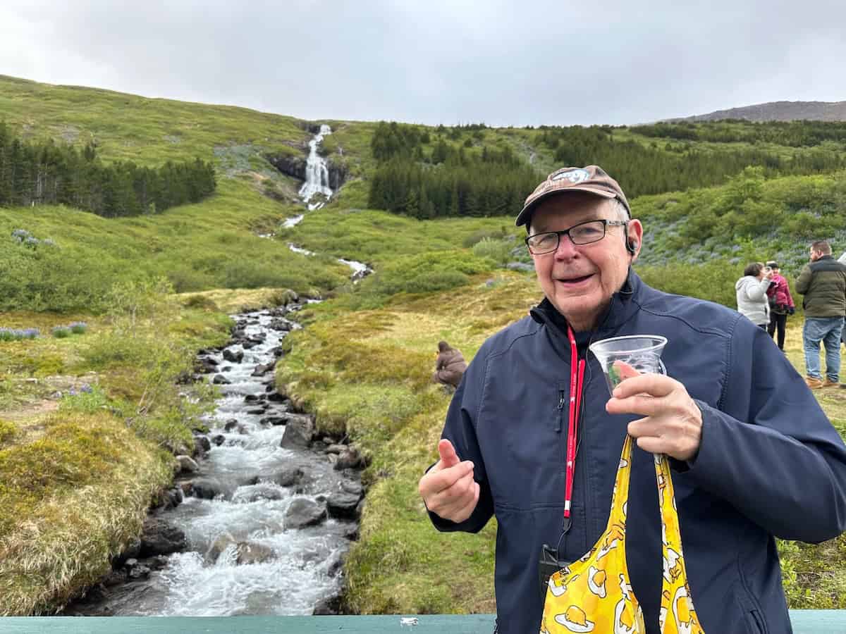 In Isafjordur, John Nowlan hopes for an extra ten years as he enjoys water from a mountain stream (credit: John and Sandra Nowlan)