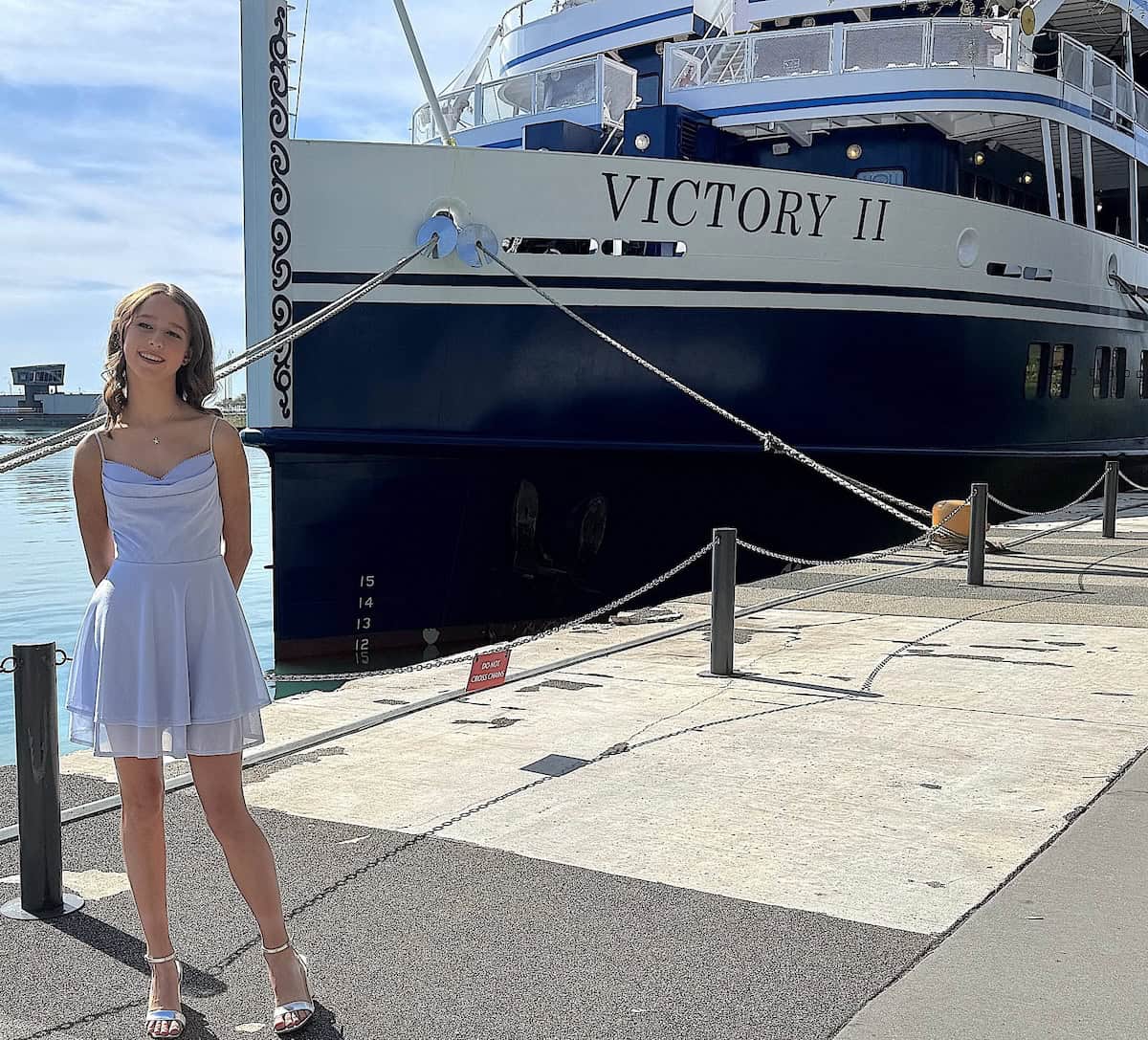 Victory II godmother Molly Grace Applegate stands beside the ship in Chicago’s Navy Pier(credit: Jackie Sheckler Finch)