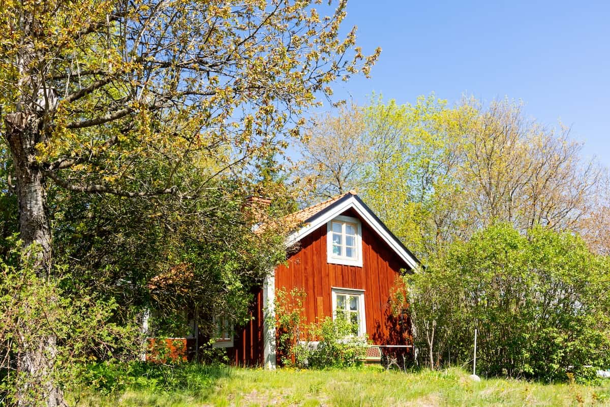 A typical red wooden house in the province of Smaland, Sweden (credit: Adobe)