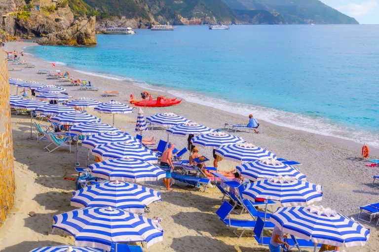 sandy beach at Monterosso Al Mare, Cinque Terre during Ferragosto (credit: Adobe)
