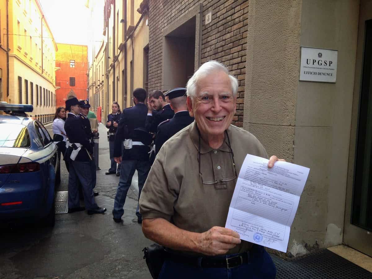 Proud recipient of the "denuncia," the official police complaint (credit; Irene S. Levine)