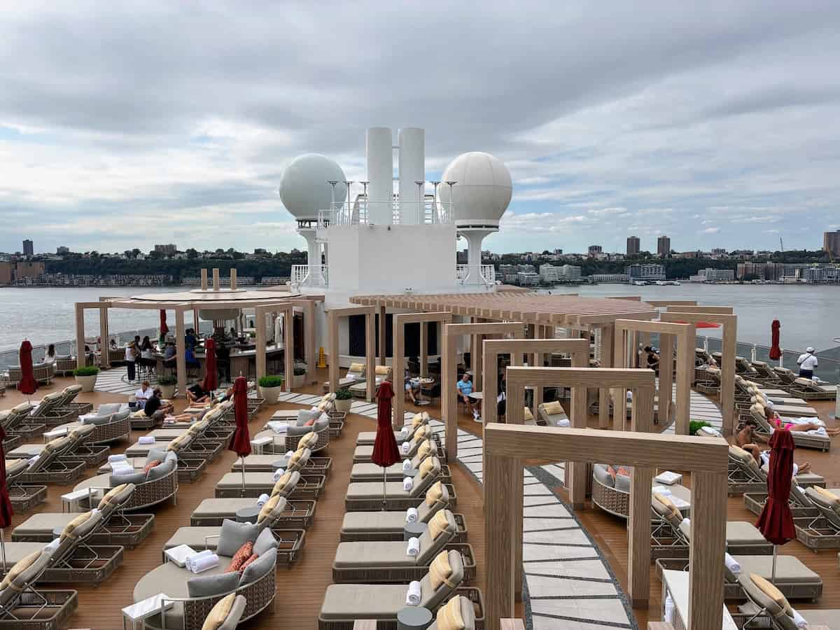 The adults-only Vibe Beach Club offers a serene retreat with infinity hot tubs and cushioned loungers — a splurge-worthy escape on sunny sea days (credit: Ashley Fenton)