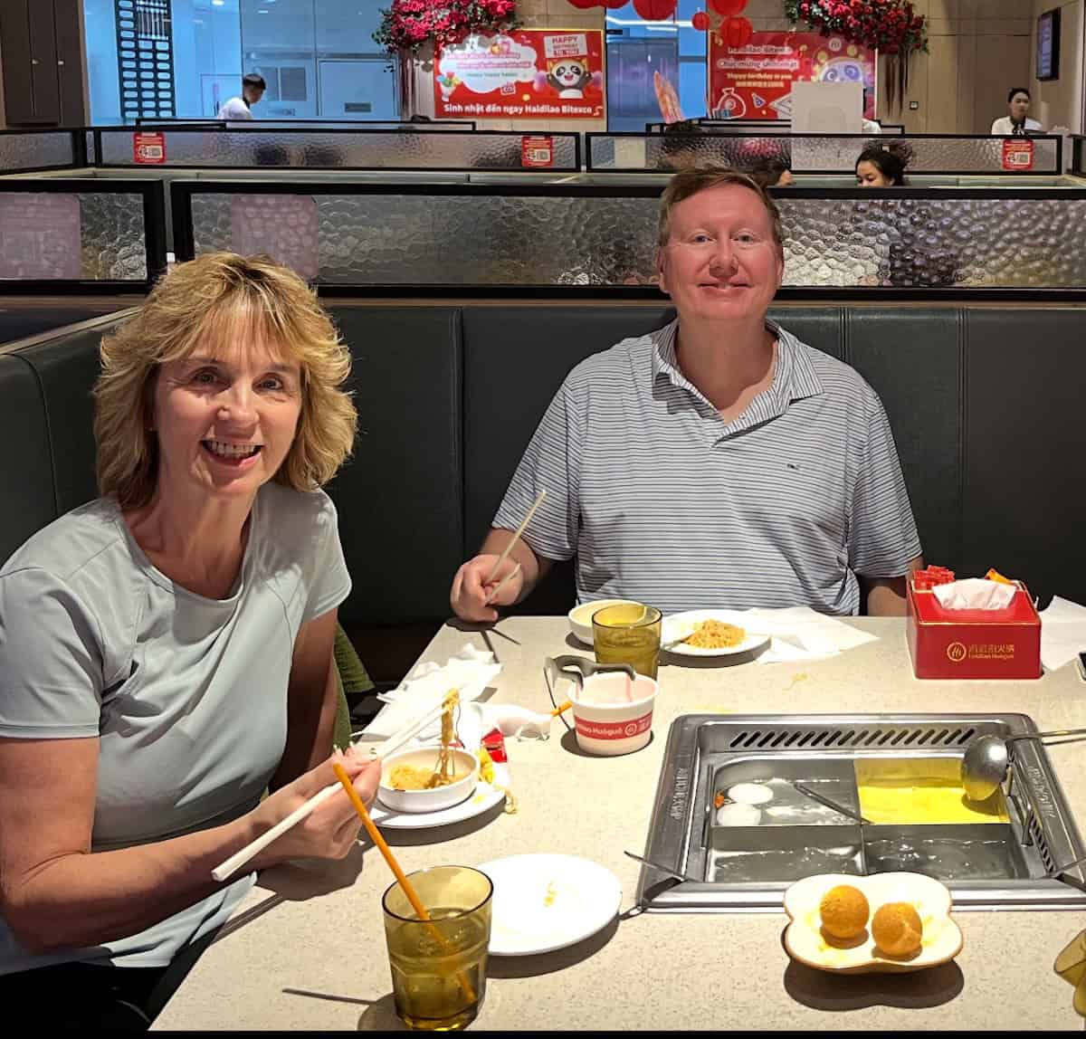 Chris and Joe Scott enjoying their Hot Pot dinner (courtesy: The Scotts)