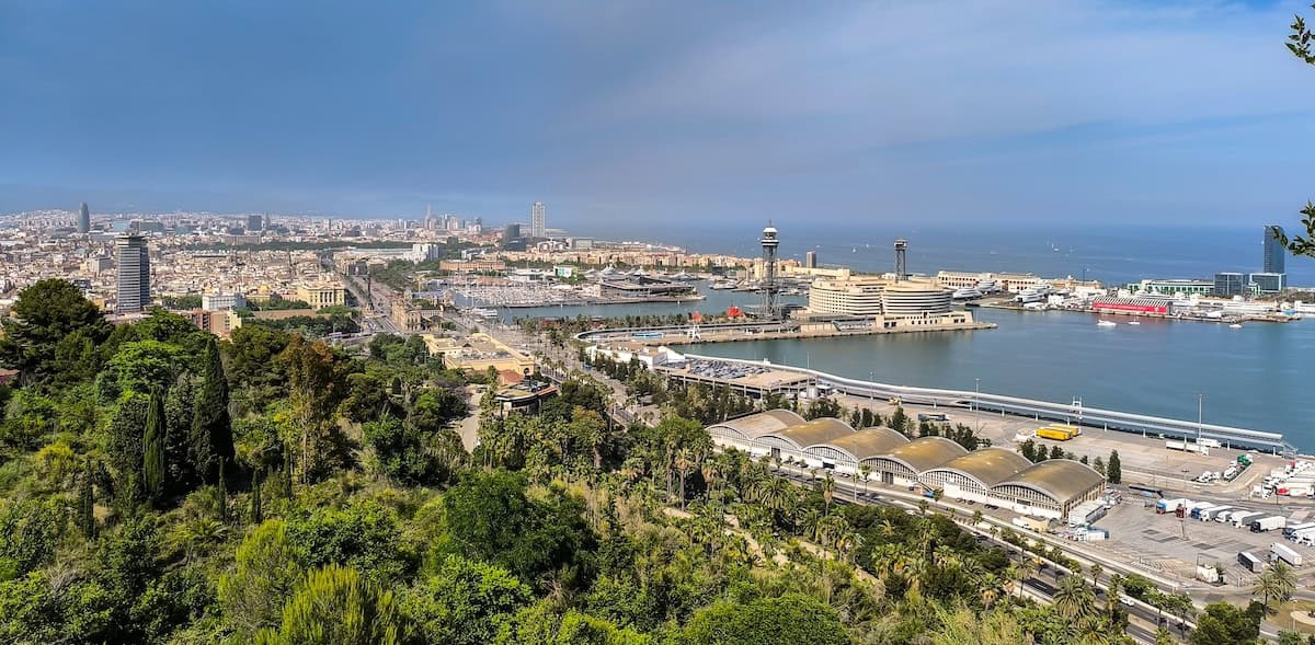 View of the city of Barcelona and its harbor from Montjuic hill (credit: Adobe stock)