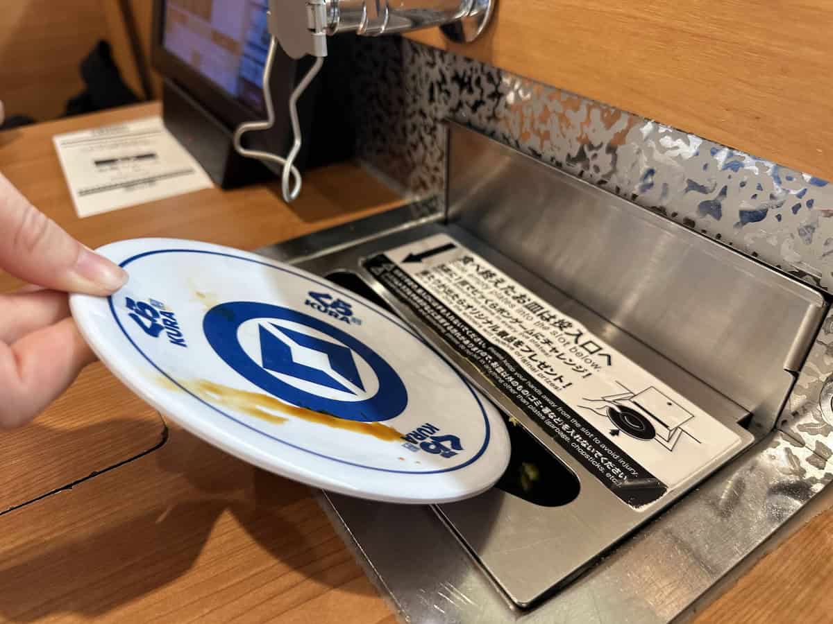 Automated dirty plate disposal at the table (credit: Jerome Levine)