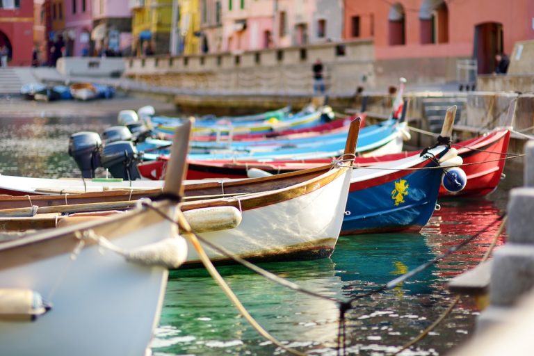 Colorful fishing boats in Vernazza in the Cinque Terre (credit: Adobe stock)