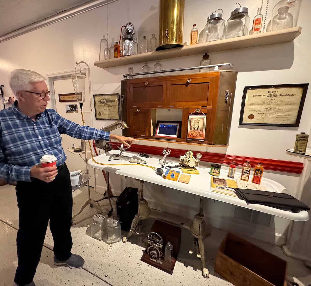 Bill explains how vintage mortician’s equipment was used (credit: Jackie Sheckler Finch)