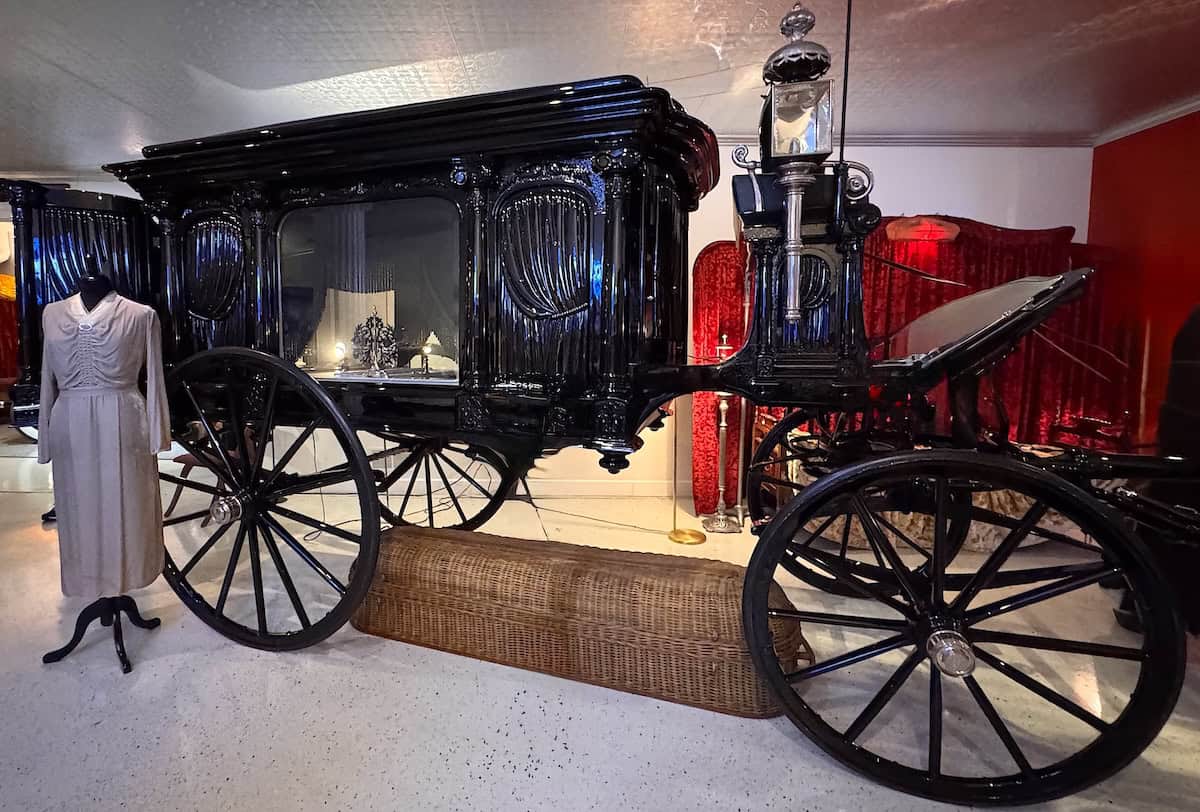 An 1895 Sayers & Scovill horse-drawn hearse built in Cincinnati. The basket under the hearse was used to transport a body from a home (credit: Jackie Sheckler Finch)